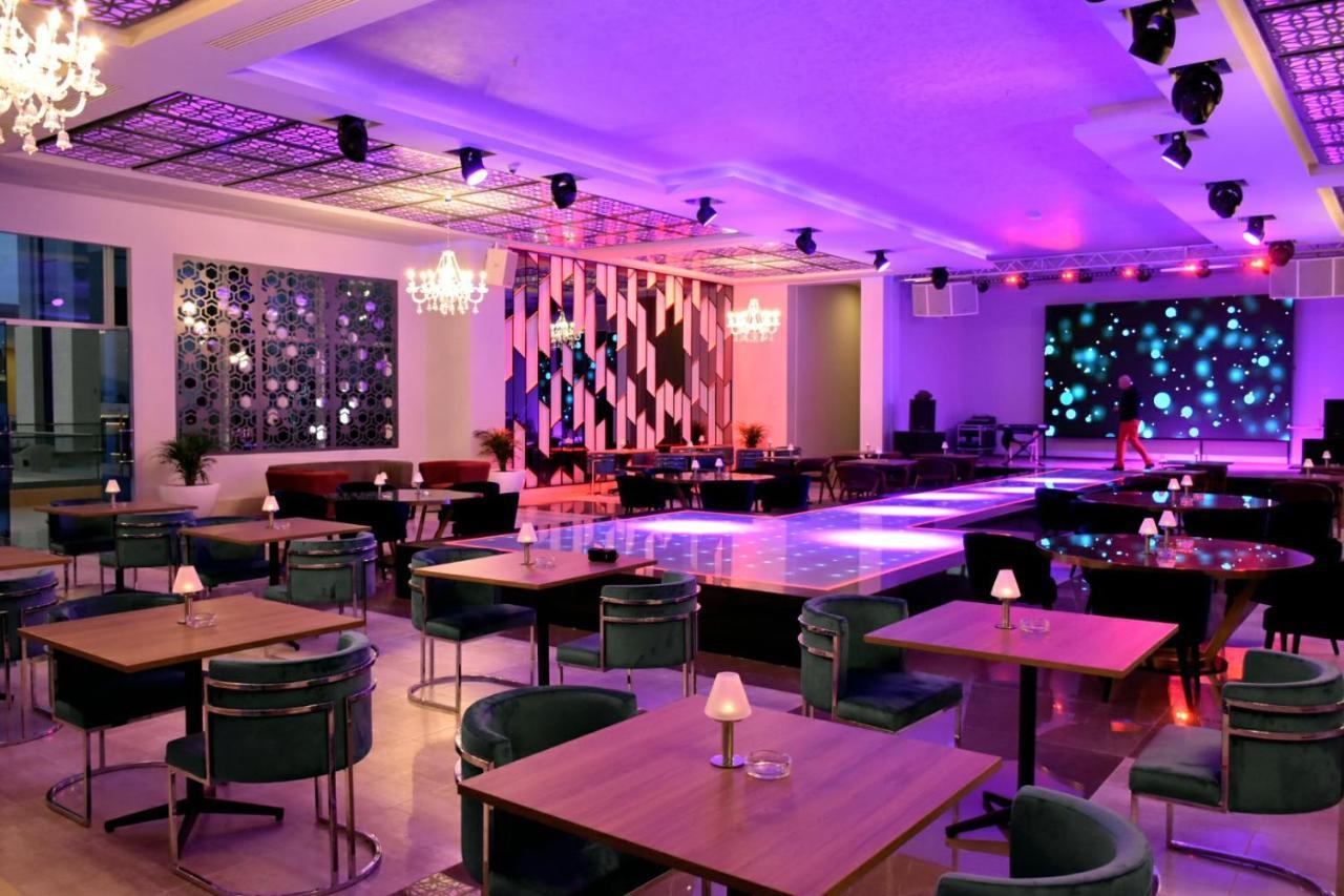 Pickalbatros White Beach Taghazout (Adults Only) Esterno foto The interior of a nightclub in India