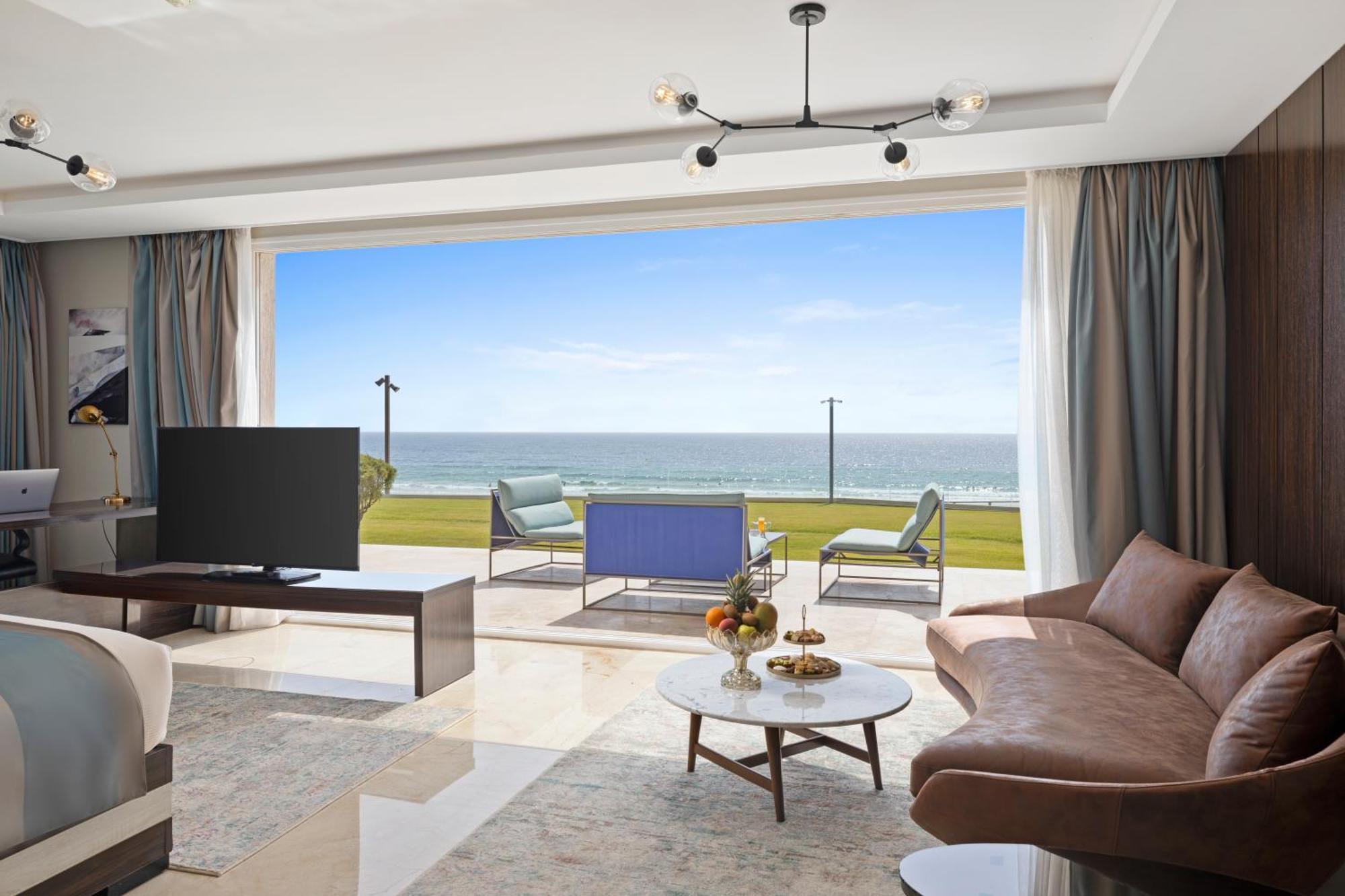 Pickalbatros White Beach Taghazout (Adults Only) Esterno foto A living room in a luxury apartment