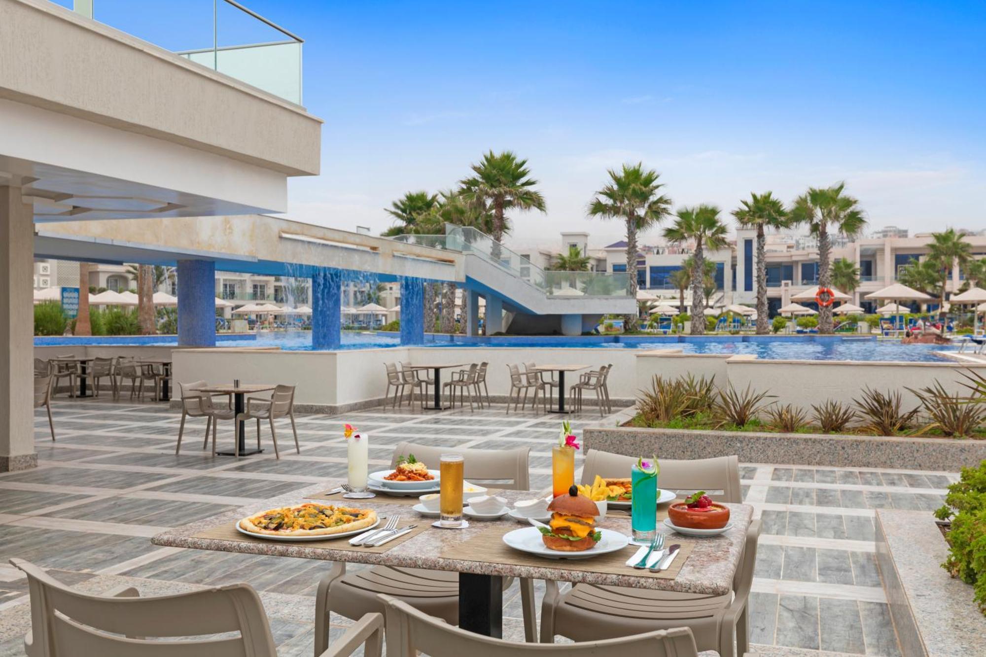 Pickalbatros White Beach Taghazout (Adults Only) Esterno foto Pool at the hotel